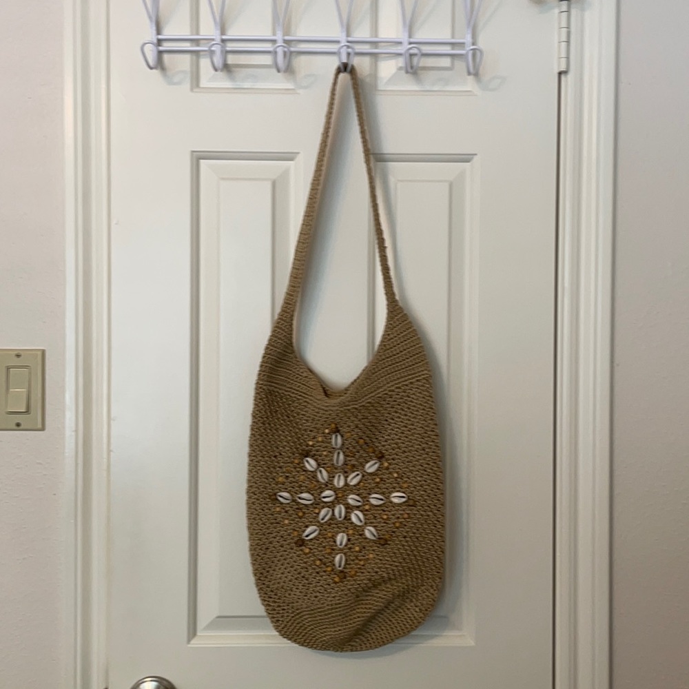 The Sak woven shoulder bag shell detail